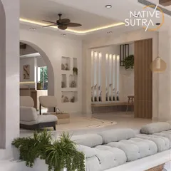This perspective highlights the built-in niches and the connection to the dining area. The entire space is designed to feel like a calm refuge, with a focus on simplicity and natural light.