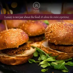 A close-up on our gourmet mini burgers, with a message that luxury is about the entire experience. Our professional servers are trained to provide the highest level of hospitality.