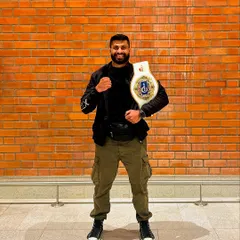Fear is the fuel, discipline is the weapon. One of my students holding his well-earned championship belt. This is what we work for.