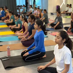 A moment of collective stillness during our International Yoga Day celebration. It is always powerful to see so many people come together to breathe and practice as one.
