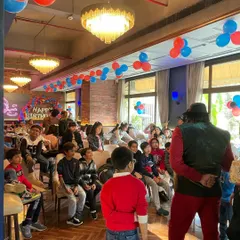 Another shot of the magic show in progress. A professional magician is a fantastic way to add a dose of wonder and excitement to any event.