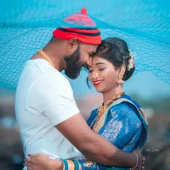 I specialize in capturing the unique spirit of Agri-Koli culture. This pre-wedding photo, with the fishing net and traditional outfits, celebrates a heritage full of life and colour against a beautiful coastal backdrop.
