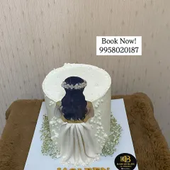A custom cake I made for a client's birthday, featuring a beautiful illustration of a girl in a white dress. The cake was part of a complete decor package I provided.