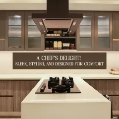 A chef's delight. This kitchen is sleek, stylish, and designed for comfort, featuring a large island cooktop, modern chimney, and ample storage with fluted glass cabinets.