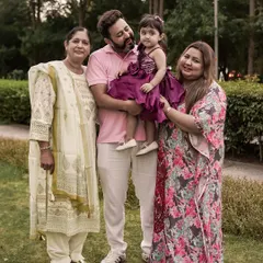 A beautiful multi-generational family portrait taken outdoors. It’s always special to include grandparents in the shoot to capture the love that spans across generations.