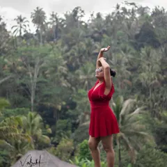 Musing my better half during our Bali trip. I woke her up early to get this perfect shot by the infinity pool, with the morning rain and lush jungle creating a truly magical and romantic backdrop.