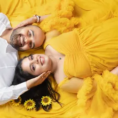 This is what pure happiness looks like. I love this unique top-down perspective for couple maternity sessions. It captures the intimate bond and shared excitement as you both look forward to your new beginning.