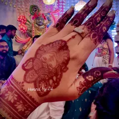 The stain on my own Shreenathji mehendi was just a dream. The deep maroon color makes the intricate details of the portrait stand out so beautifully.