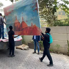 The delivery process for the massive Kamakhya Temple painting. We take great care in transporting even the largest canvases, and we reuse packing materials to ensure nothing goes to the landfill.