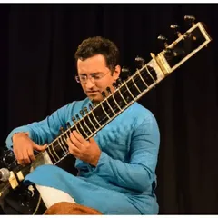 A focused moment during my sitar recital at the prestigious India International Centre (IIC) in Delhi. I am available for solo performances at cultural festivals and venues.