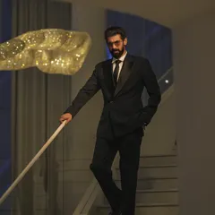 A full-length view of Rana Daggubati's IIFA look, showing how the double-breasted tuxedo creates a strong, statuesque silhouette. It’s all about confident and timeless red carpet style.