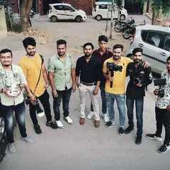 Here is my team and I on location for a wedding shoot. For large events, we work together to ensure every angle is covered, coordinating between aerial drone shots and ground-level photography.