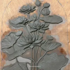 This is the first stage of the Lotus mural, sculpted entirely from clay. At this point, the focus is on establishing the composition, flow, and balance of the piece before it is cast and refined.