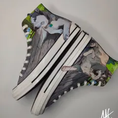 These custom Chuck 70s feature two huskies, Loki and Blue. I painted each dog on one shoe, capturing their distinct personalities for a truly personal pair of kicks.
