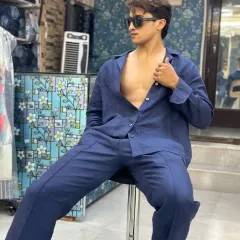 Unbuttoned confidence in this navy blue linen co-ord set. The relaxed fit of the shirt and trousers is perfect for a casual yet stylish look that feels effortlessly cool.