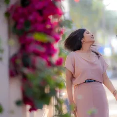 This is proof that you don't need to be a model to have a great photoshoot. We just walked, talked, and captured some genuinely happy moments against a backdrop of beautiful bougainvillea.