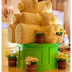 A stunning, large-scale teddy bear sculpture made from thousands of yellow flowers was the undisputed star of this 'Teddy in London' first birthday party. It's a perfect example of how I create luxurious and memorable centrepieces.