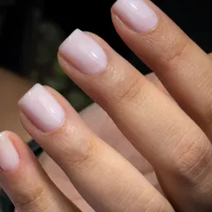 This is the viral "soap nails" look, part of the clean girl aesthetic. I achieved this minimal, glossy, and classy finish using a sheer pink BIAB overlay for a healthy, natural look.