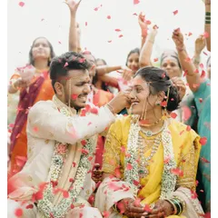 The air filled with laughter and a shower of petals during Pratik and Yamini's Maharashtrian wedding. This is the kind of uninhibited joy I live to capture, a candid moment of pure celebration.