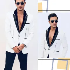 For that cocktail party or reception, a sharp tuxedo is a must. This white blazer with a contrasting black lapel is a modern, confident choice that I offer for men who want to make a statement.