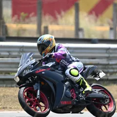 A rider on a Yamaha R15 at the track. Our training is for everyone, and we help riders of all bike types improve their skills and confidence.