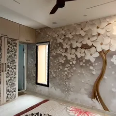 Here is a popular 3D floral tree wallpaper that I installed in a Goregaon bedroom. The design adds depth and a serene feeling to the room, making the wall behind the bed a stunning focal point.