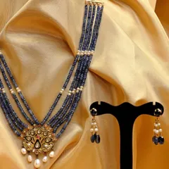 This iridescent peacock pendant set, featuring Kundan work and sapphire beads, was our special offering for the festival of colours, Holi. The vibrant enamel work on the pendant perfectly captures the festive spirit.