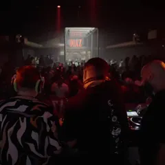 The view from behind the decks during a B2B set in Goa. It's a unique perspective, watching two other artists work while anticipating your turn to contribute to the journey.