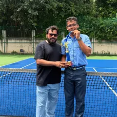 Celebrating with Taanishq Mandaliya from the silver-medalist Boys Under-19 team at the CBSE Cluster Championship. His performance was crucial for the team's success.