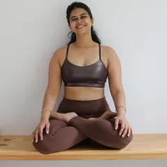 A simple portrait, sitting in a foundational yoga pose. This image reflects the core of my work: grounded, approachable, and rooted in the practice.