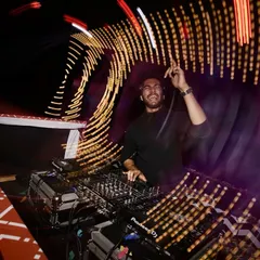 A shot from a fantastic wedding afterparty in Goa. I use creative lighting and a dynamic setlist to make sure the celebration is visually stunning and keeps everyone dancing all night. This is what a professional wedding DJ set looks like.