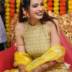 A perfect accessory for every bride-to-be. My lovely bride Anusshka, looking radiant and happy during her mehendi ceremony.