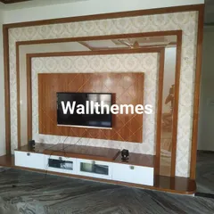 A completed installation of a damask wallpaper around a custom-built TV and entertainment unit. This shows my precision in working with existing woodwork.