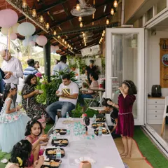 A duplicate of the rooftop party meal scene.