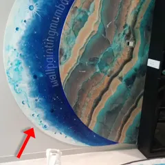 This Blue Moon wall mural features a beautiful embossed or 3D effect, making it feel like it's popping off the wall. The deep blues and sparkling details create a celestial, calming vibe, perfect for a bedroom or a quiet office space.