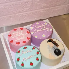 A dreamy set of four birthday bento cakes for a "twenty something" celebration. Each cake has a unique design, including a chic illustration, delicate roses, and sweet messages, all in a lovely pastel color palette.