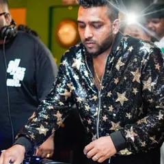 Focused and in the moment. When I'm on the decks, my entire world is about the music and the story I'm telling through it.