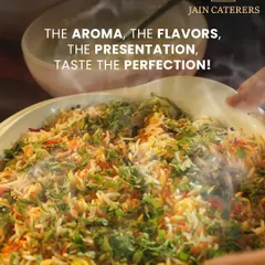 The aroma, the flavours, the presentation, the perfection. A close-up of our vegetable biryani, garnished with fresh herbs, steaming and ready to be served.