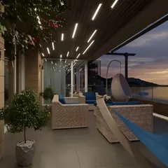 This spacious terrace is designed for ultimate relaxation with multiple seating options, including cushioned wicker sofas, a hanging swing chair, and a hammock. The open design offers stunning sunset views over the water, making it a perfect evening lounge.