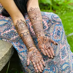 A full-coverage bridal design with a variety of patterns on each arm. One arm features a bride and groom, while the other has personalized initials, telling a complete story.