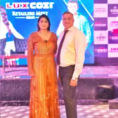 Posing with a key distributor at the Lux Industries event. I make it a point to connect with your important partners and acknowledge their contributions.