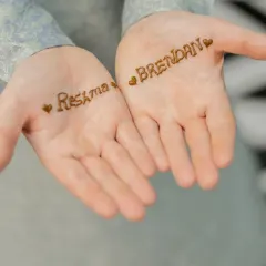 A sweet and simple way to celebrate a partnership. I can write names in henna for couples, a popular choice for engagement parties or sangeets.