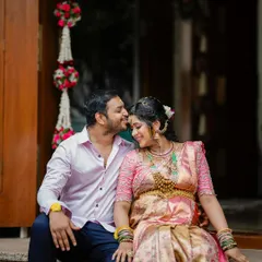 A sweet and intimate moment between the couple during their maternity shoot. The expecting mother looks absolutely radiant.