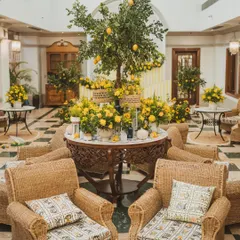 A fresh and vibrant Haldi ceremony setup, bursting with the cheerful energy of sunflowers, lemons, and wicker furniture. This shows how I infuse traditional events with a unique and modern aesthetic.