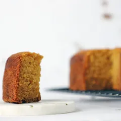 You can't go wrong with a classic vanilla cake. Mine is wonderfully gooey and delicious, made with love and without any sugar, butter, or maida. It's a simple slice of heaven.