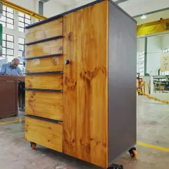 This mobile cabinet, complete with multiple drawers and a cupboard section, is a testament to the comprehensive furniture-making skills our students acquire.