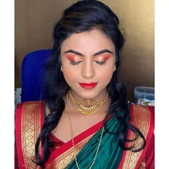 A close up of the festive makeup for a friend's wedding. The dual-toned eyeshadow with gold and red hues perfectly matches the traditional saree.