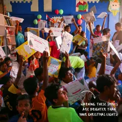 Warning: these smiles are brighter than your Christmas lights. The children proudly hold up their certificates and artwork during our Christmas celebration, a testament to the joy and confidence they've gained.