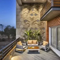 This spacious balcony features a striking 3D geometric tile wall, creating a modern and artistic backdrop. The comfortable outdoor furniture makes it an ideal spot for relaxation and social gatherings.
