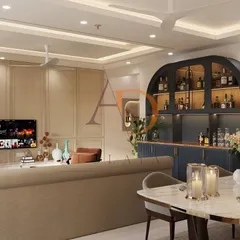 An open-concept living and dining area where the custom bar unit serves as a stylish divider. The cohesive design ensures a smooth flow between the different zones, making the space feel both integrated and spacious.
